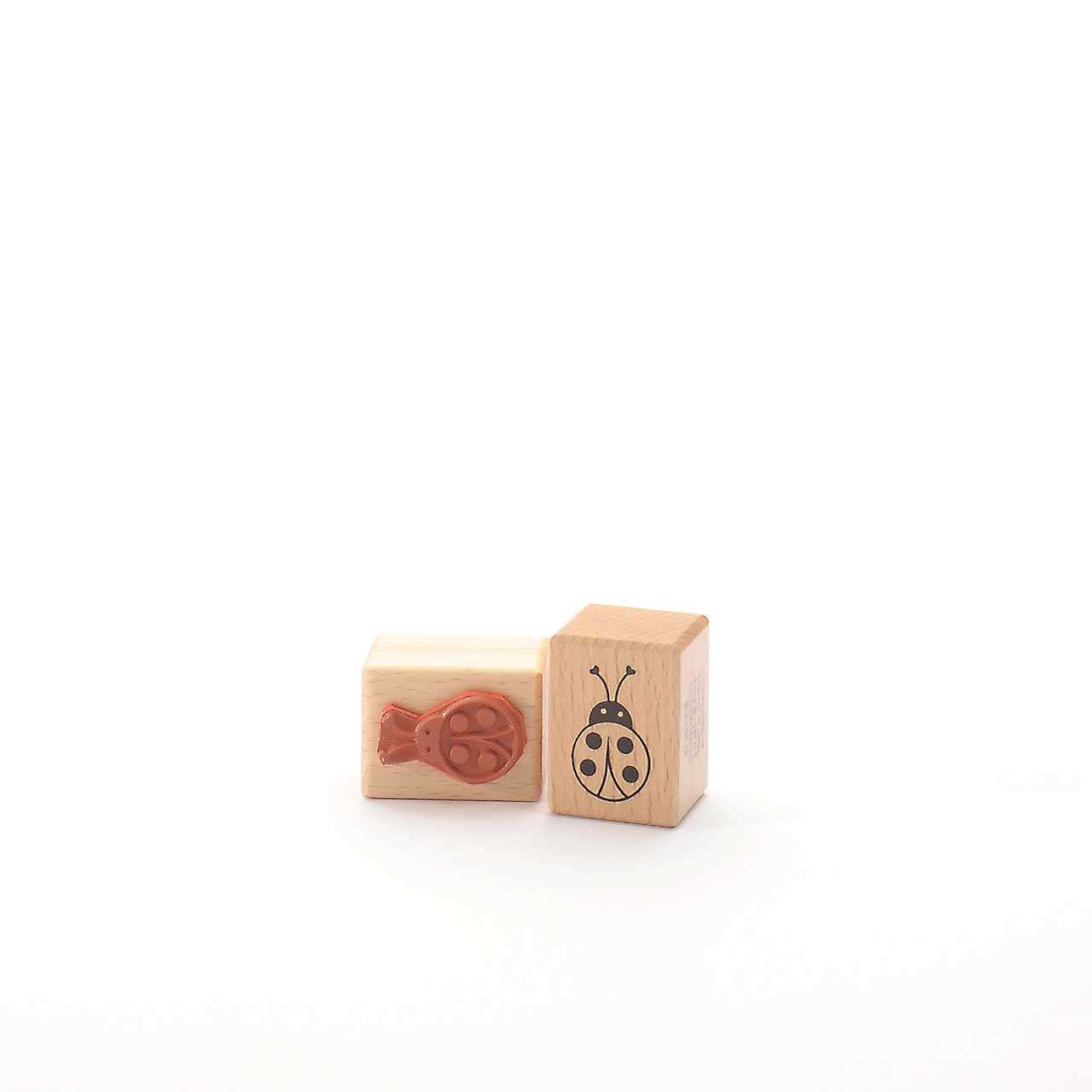 Motivstempel Titel: Knopf Käfer